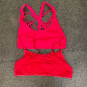 Two red Victoria Secret/Pink bras